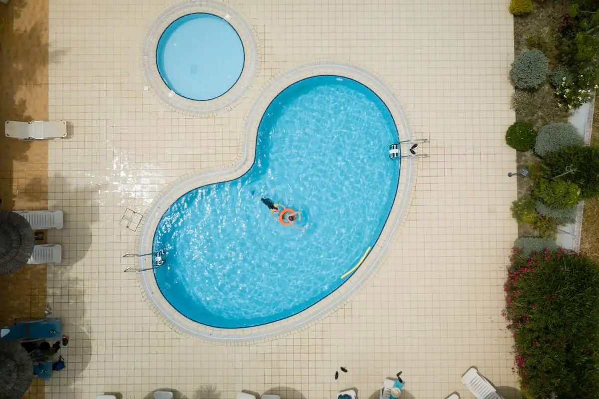 Experience the Charm of a Kidney Shaped Pool Today!