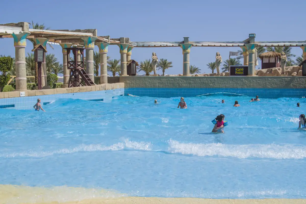 The children thrive with swimming in a wave pool at Cleo water park located at the hotel Hilton Sharm Dreams Naama Bay, Egypt